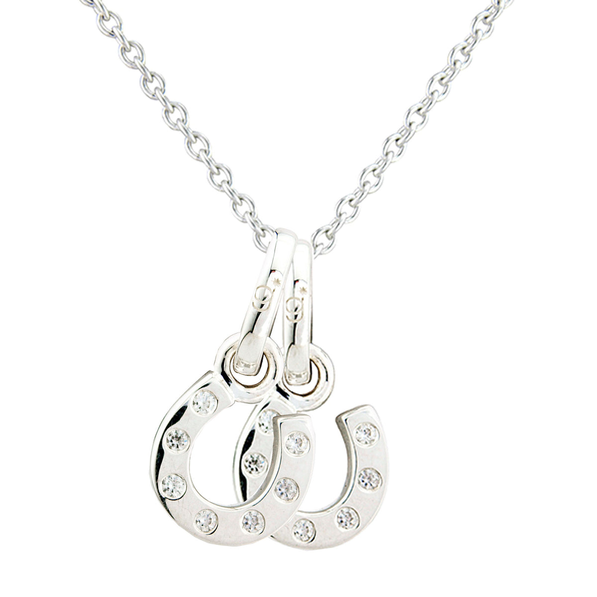 A silver-toned necklace featuring a double-horseshoe pendant embellished with small clear rhinestones, shown against a plain white background.