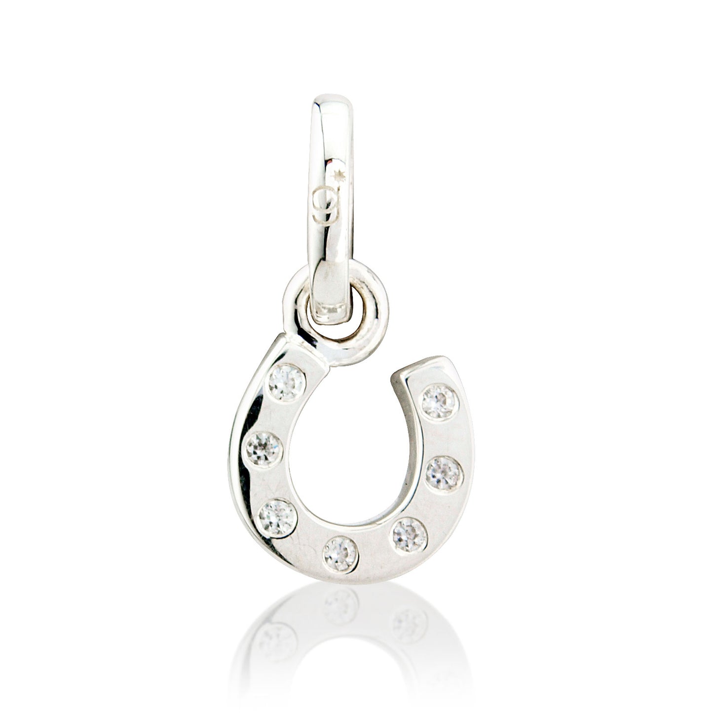 Silver horseshoe pendant with embedded crystals on a white background