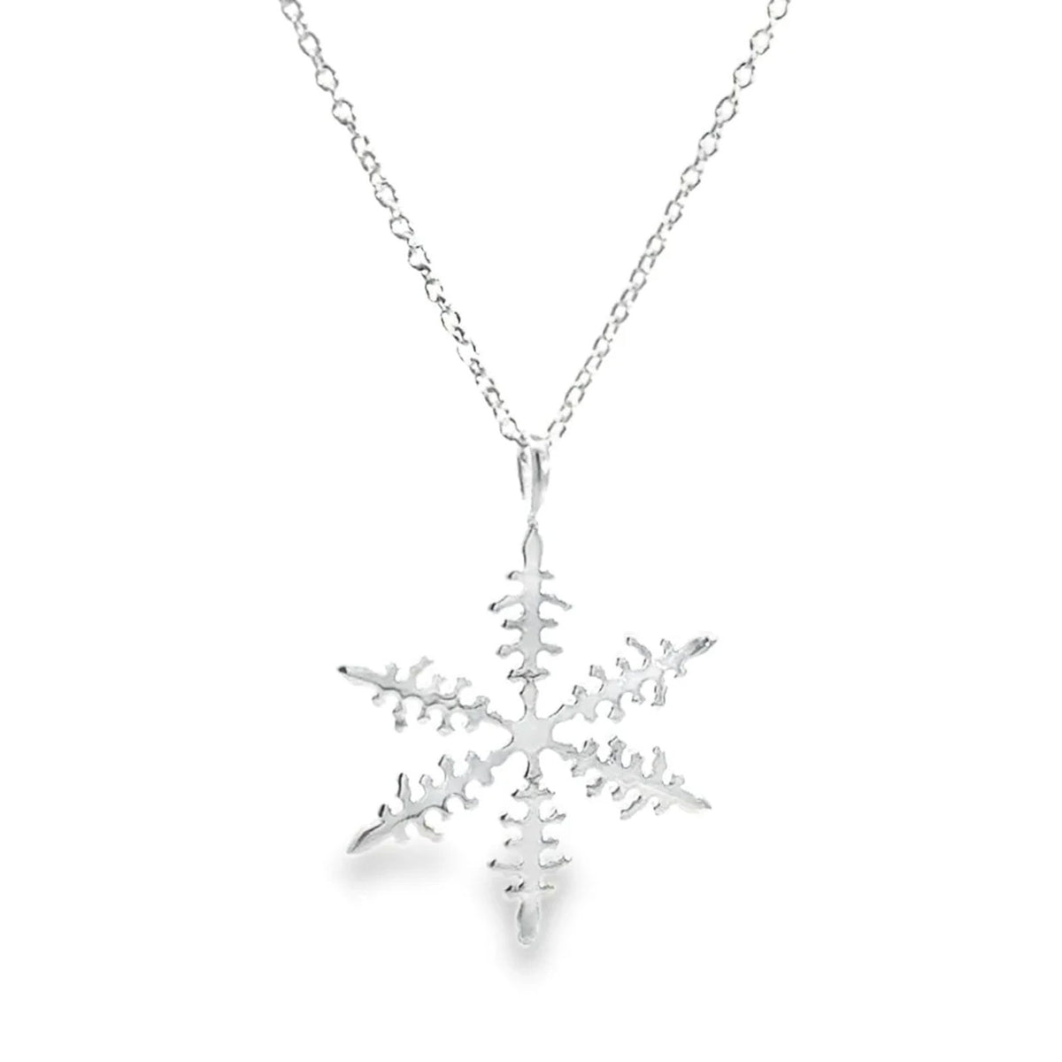 A silver snowflake pendant necklace on a delicate silver chain, shown against a plain white background.