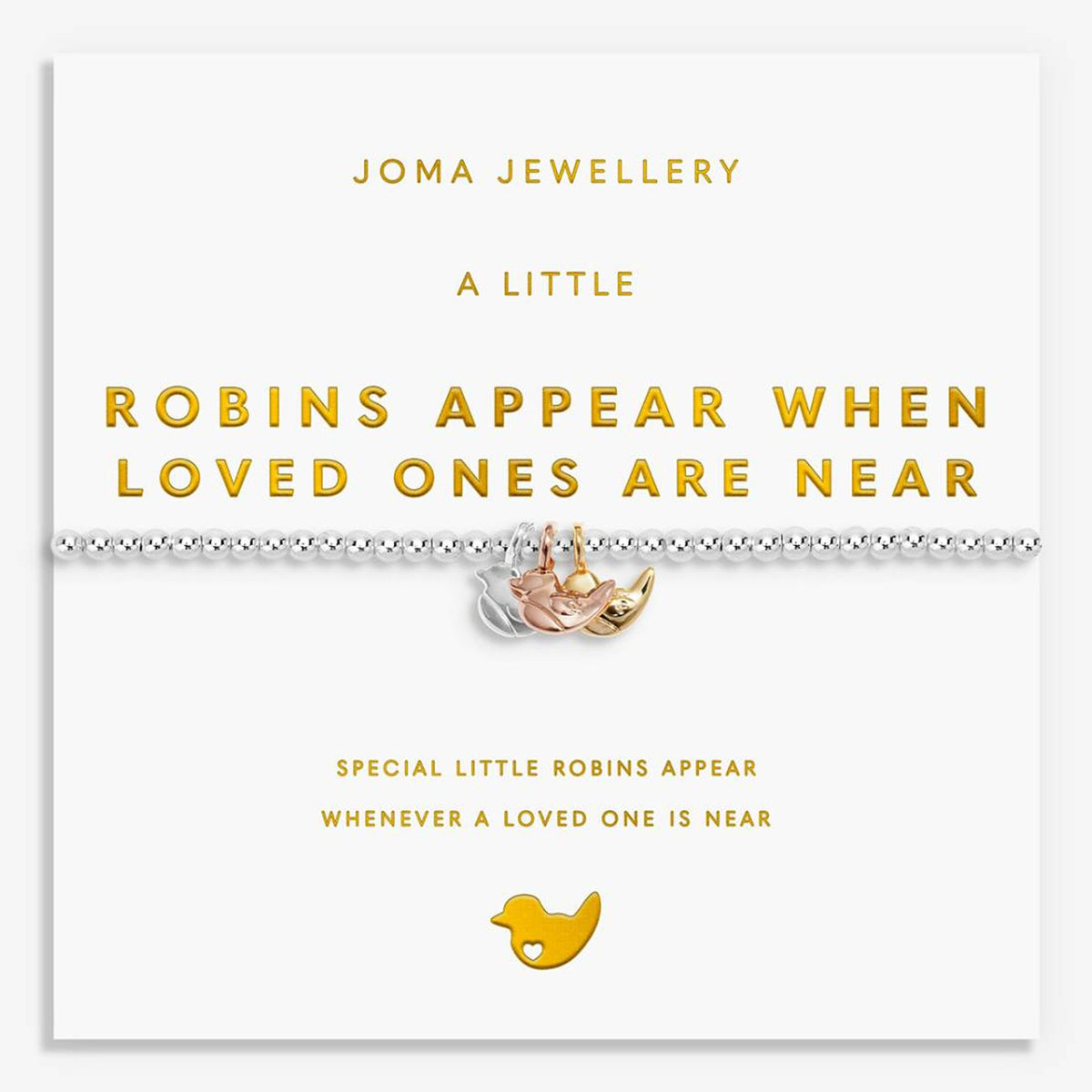 A silver beaded bracelet with a small gold and rose gold robin charm, presented on a white Joma Jewellery gift card with gold text.
