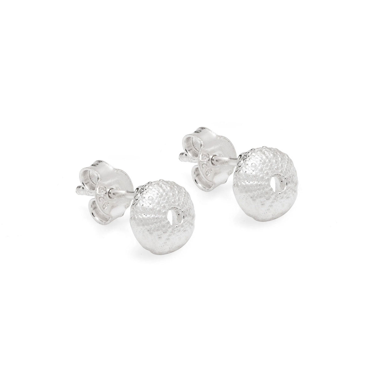 A pair of silver sea urchin stud earrings with textured, hammered circular dangles, shown on a clean white background.