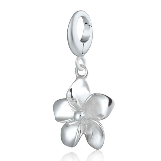 Silver flower-shaped pendant on a white background