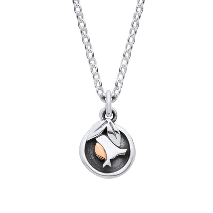 A silver chain necklace with a round pendant featuring a stylized fish design in polished silver over a dark textured background, with a small rose gold accent.