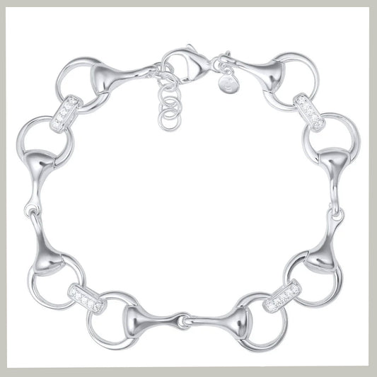 A silver horsebit link bracelet with clear crystal accents, displayed on a clean white background with a light gray border.