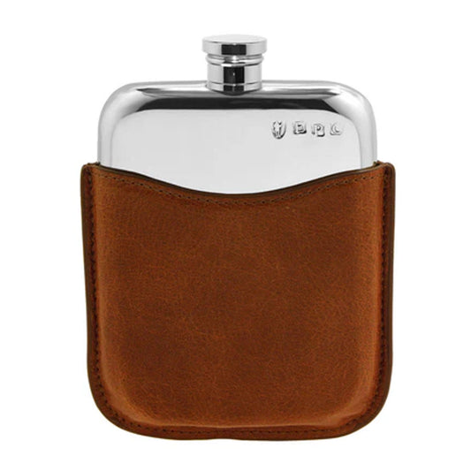 Silver flask with a brown leather case on a white background