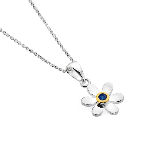 Flower-shaped pendant necklace with a blue gemstone on a white background