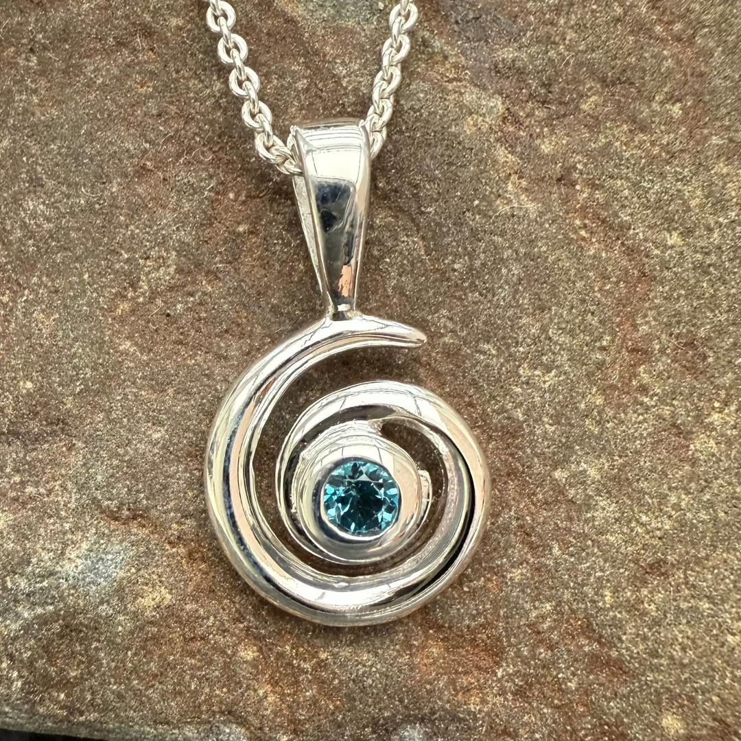 Spiral-with-topaz-stone-necklace