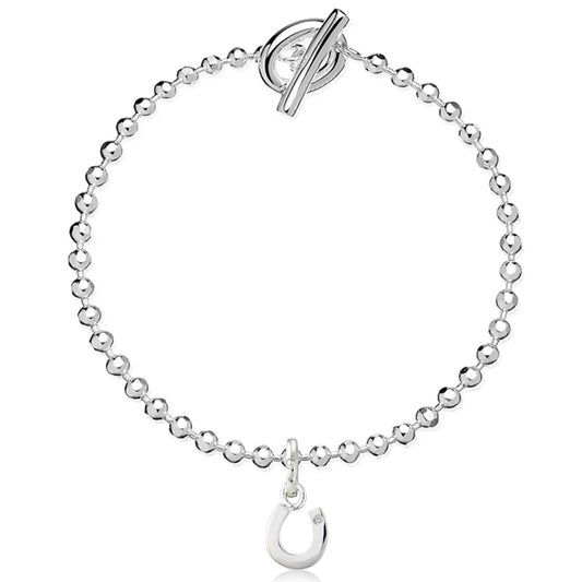 Silver bracelet with a toggle clasp and hook charm on a white background