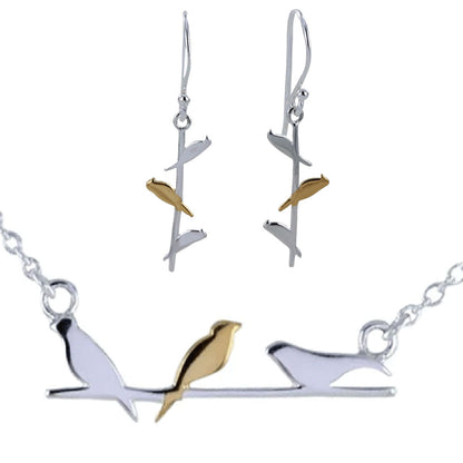 Bird-shaped jewelry set with necklace and earrings on a white background