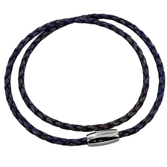 Brown braided cord bracelet with a silver clasp on a white background