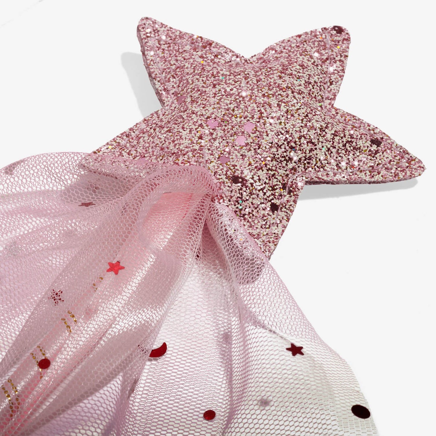 Pink star-shaped hair clip with tulle and sequin details on a white background