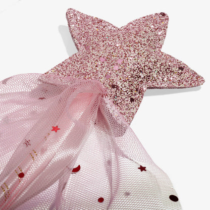 Pink star-shaped hair clip with tulle and sequin details on a white background