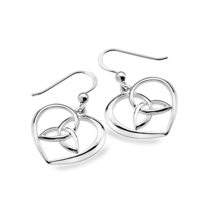 A pair of silver dangle earrings featuring an open heart design with a Celtic knot motif in the center, shown on a clean white background.