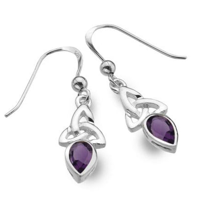 A pair of sterling silver dangle earrings with Celtic knot designs and teardrop-shaped purple amethyst gemstones, shown on a clean white background.
