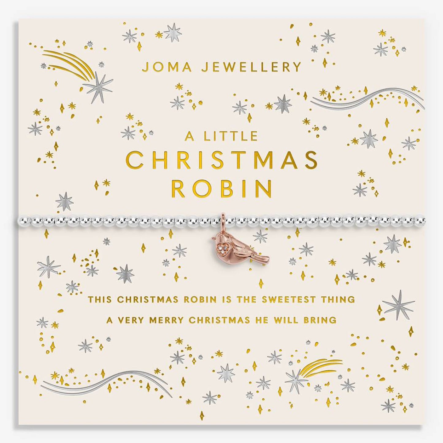 A Christmas-themed card from Joma Jewellery featuring a small rose gold robin charm suspended across a silver beaded band. The cream card is decorated with gold and silver glitter, snowflakes, and festive text reading 'A LITTLE CHRISTMAS ROBIN' and 'THIS CHRISTMAS ROBIN IS THE SWEETEST THING A VERY MERRY CHRISTMAS HE WILL BRING'.