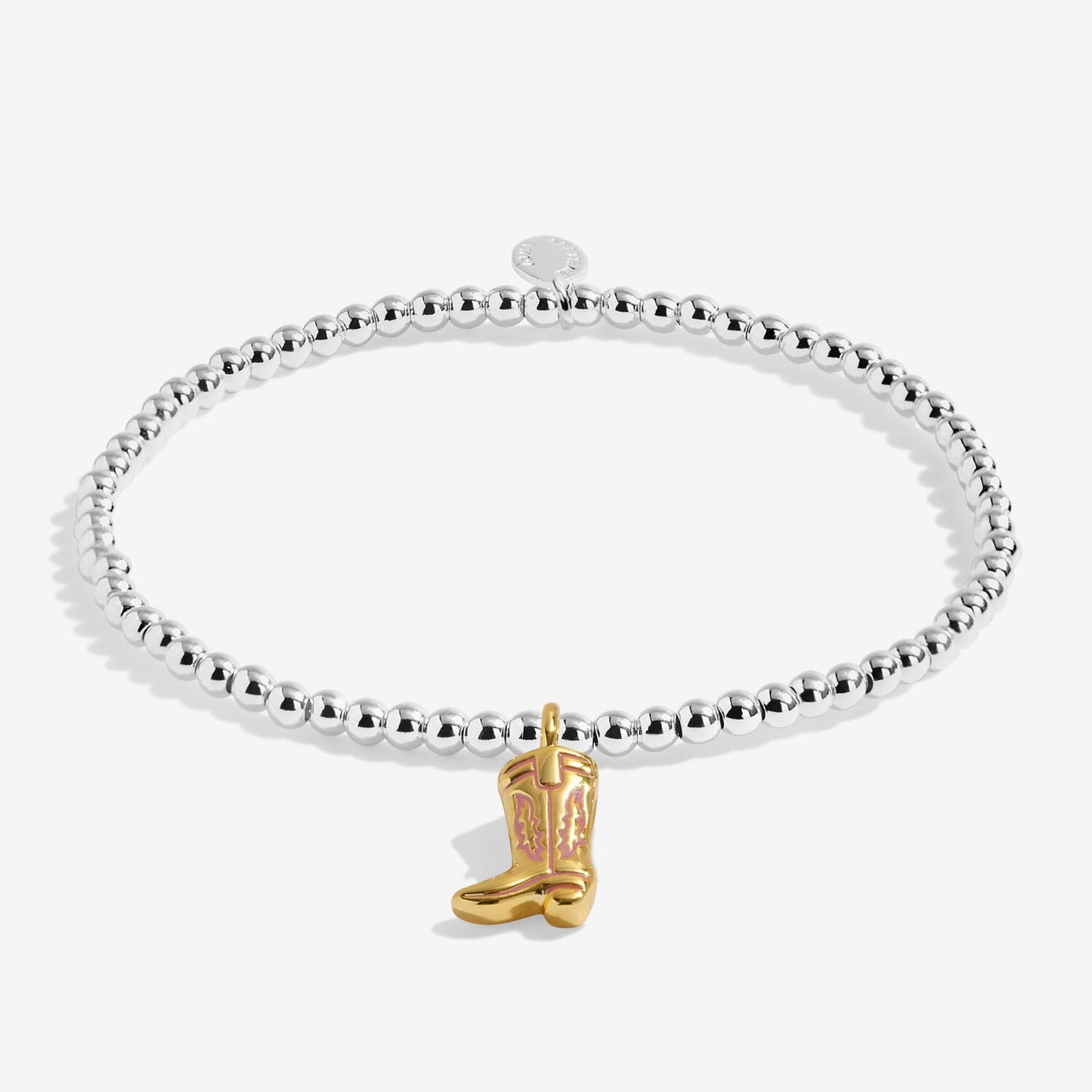 Silver bracelet with a gold cowboy boot charm on a white background