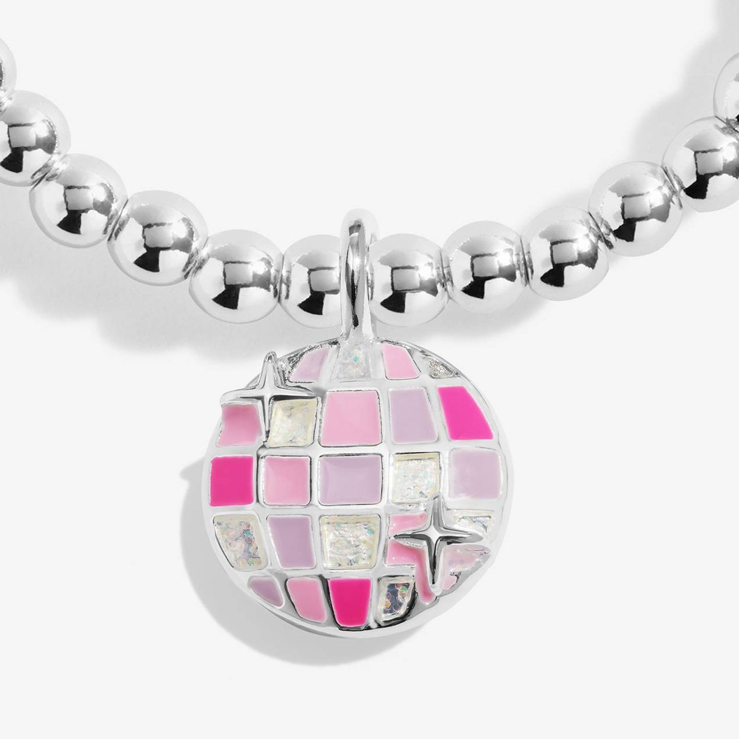 A close-up of a silver beaded necklace with a round disco ball pendant featuring pink and light purple mosaic tiles and star accents, set against a clean white background.