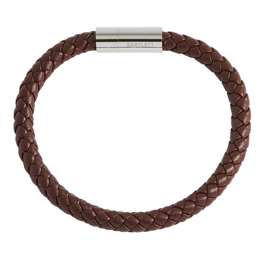 Brown braided leather bracelet with a silver clasp on a white background