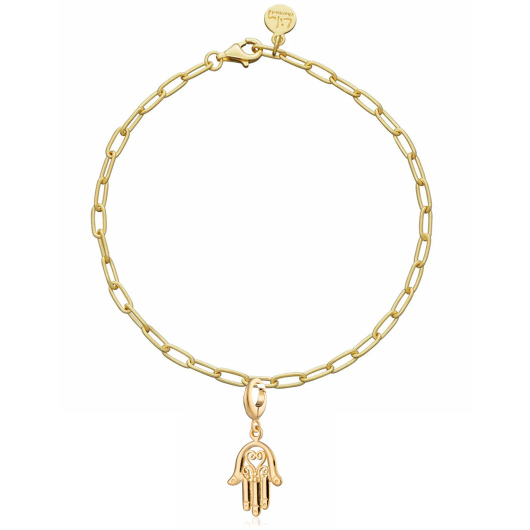 Gold chain bracelet with a hamsa hand charm on a white background
