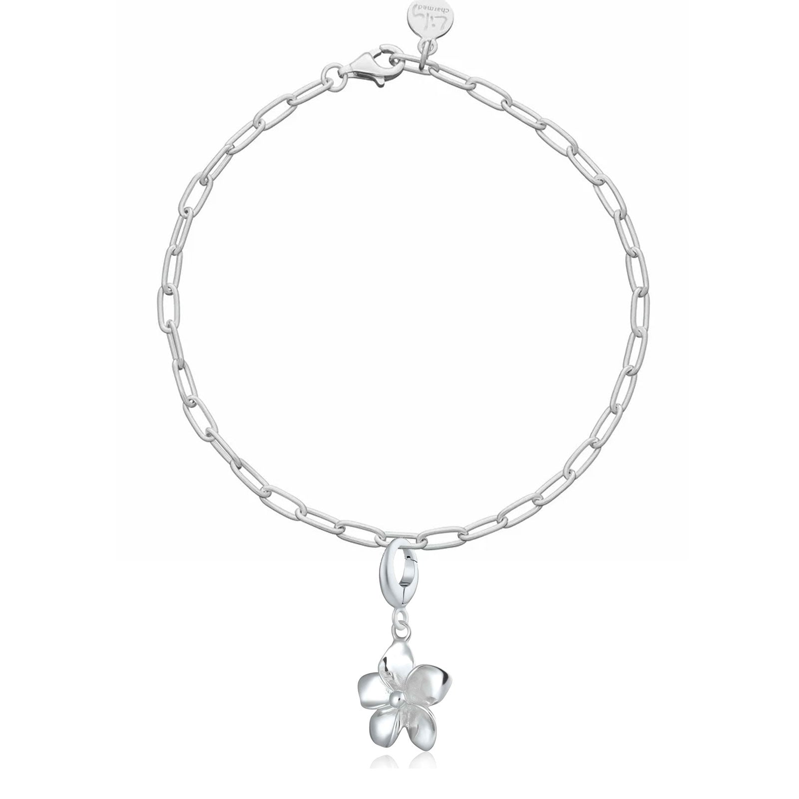 Silver chain bracelet with a flower-shaped charm on a white background