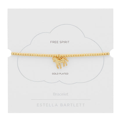 Gold-plated bracelet with a horse charm on a white card with 'Estella Bartlett' branding.