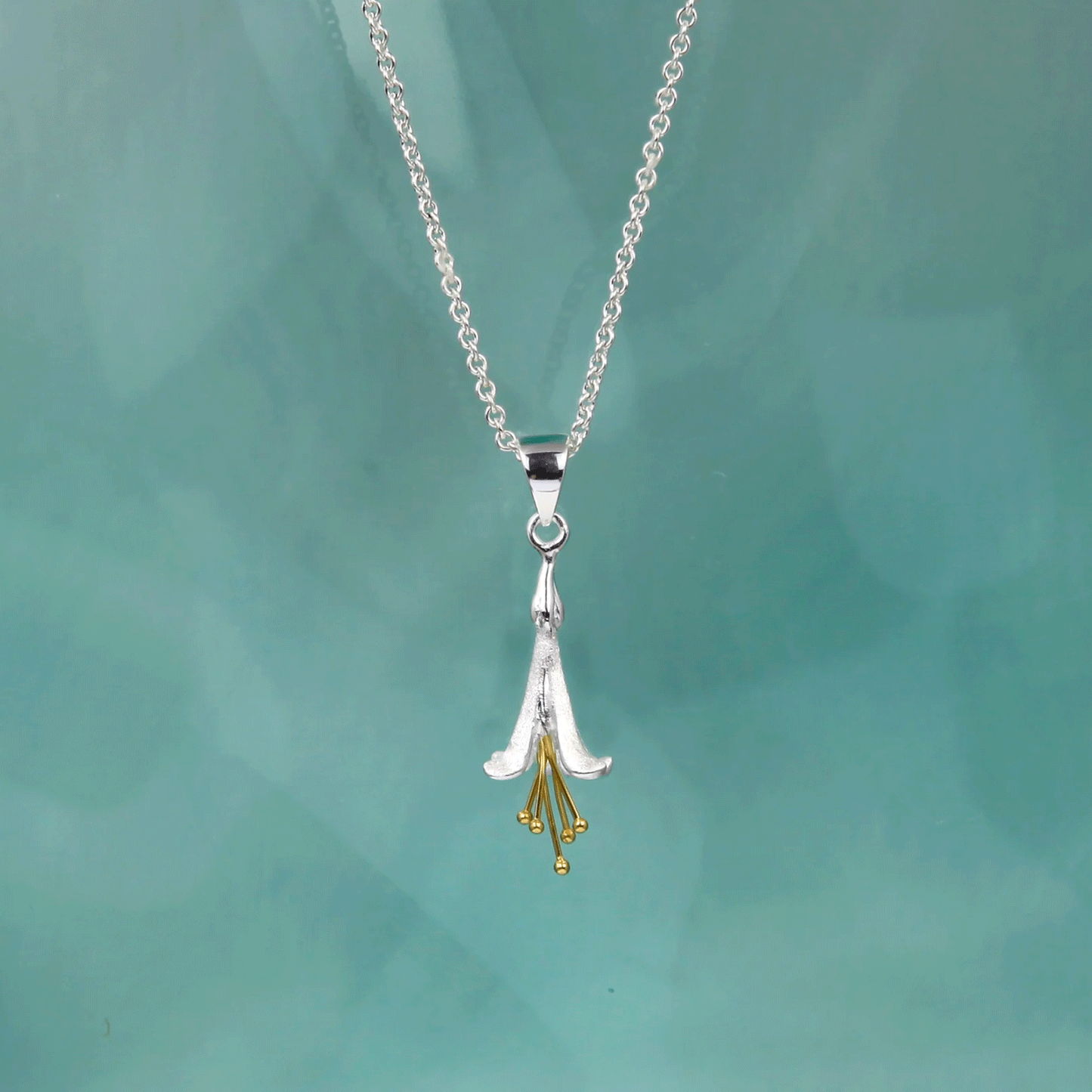 Christin Ranger gorgeous floral fuchsia pendant necklace. Fuchsia Necklace