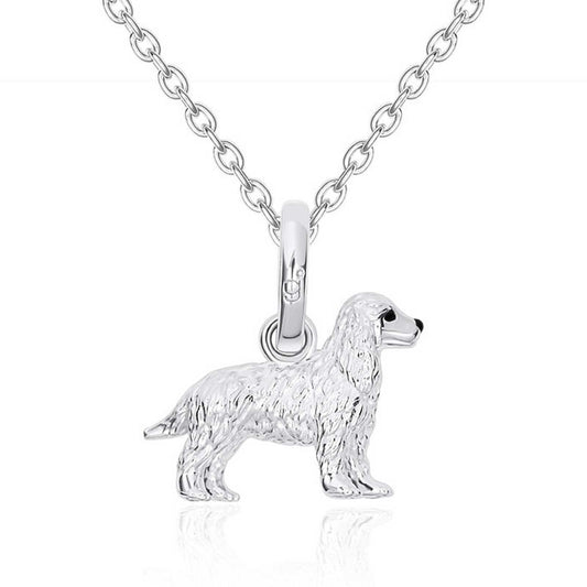 Silver dog pendant on a chain against a white background