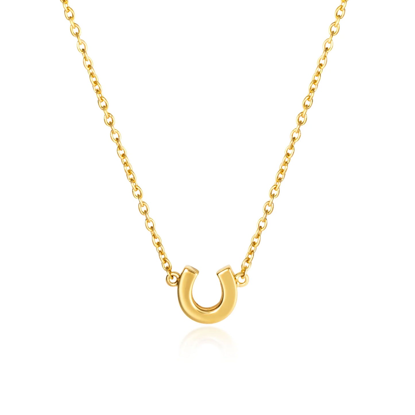 Gold horseshoe necklace on a white background