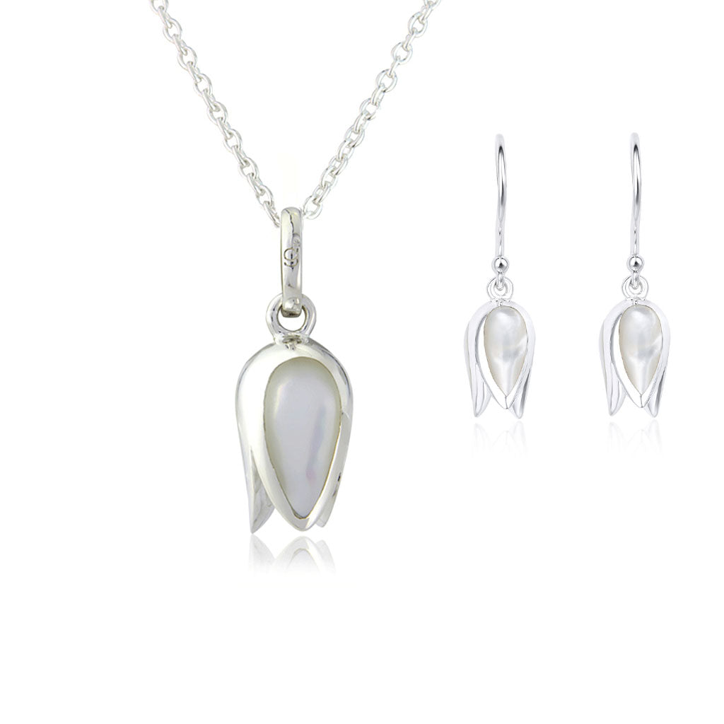 Silver tulip necklace and earrings with white pearl on a white background