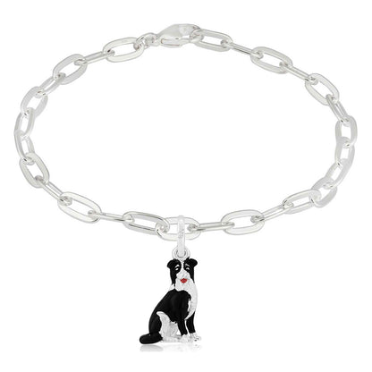 Silver chain bracelet with a dog charm on a white background