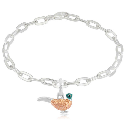 oval link bracelet with pheasant charm on white background