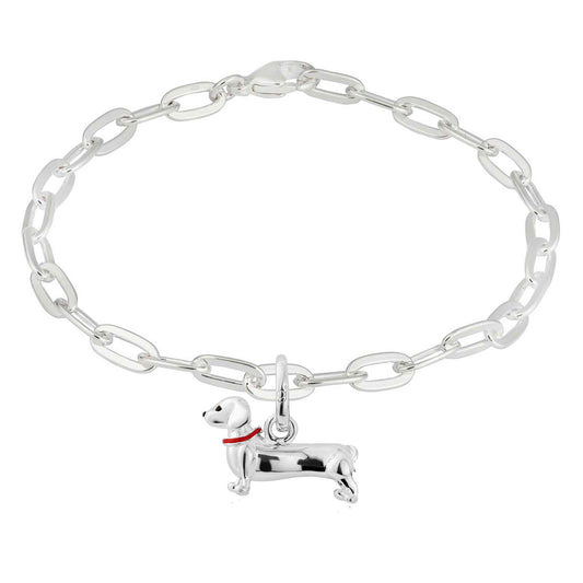 Silver chain bracelet with a dog charm on a white background