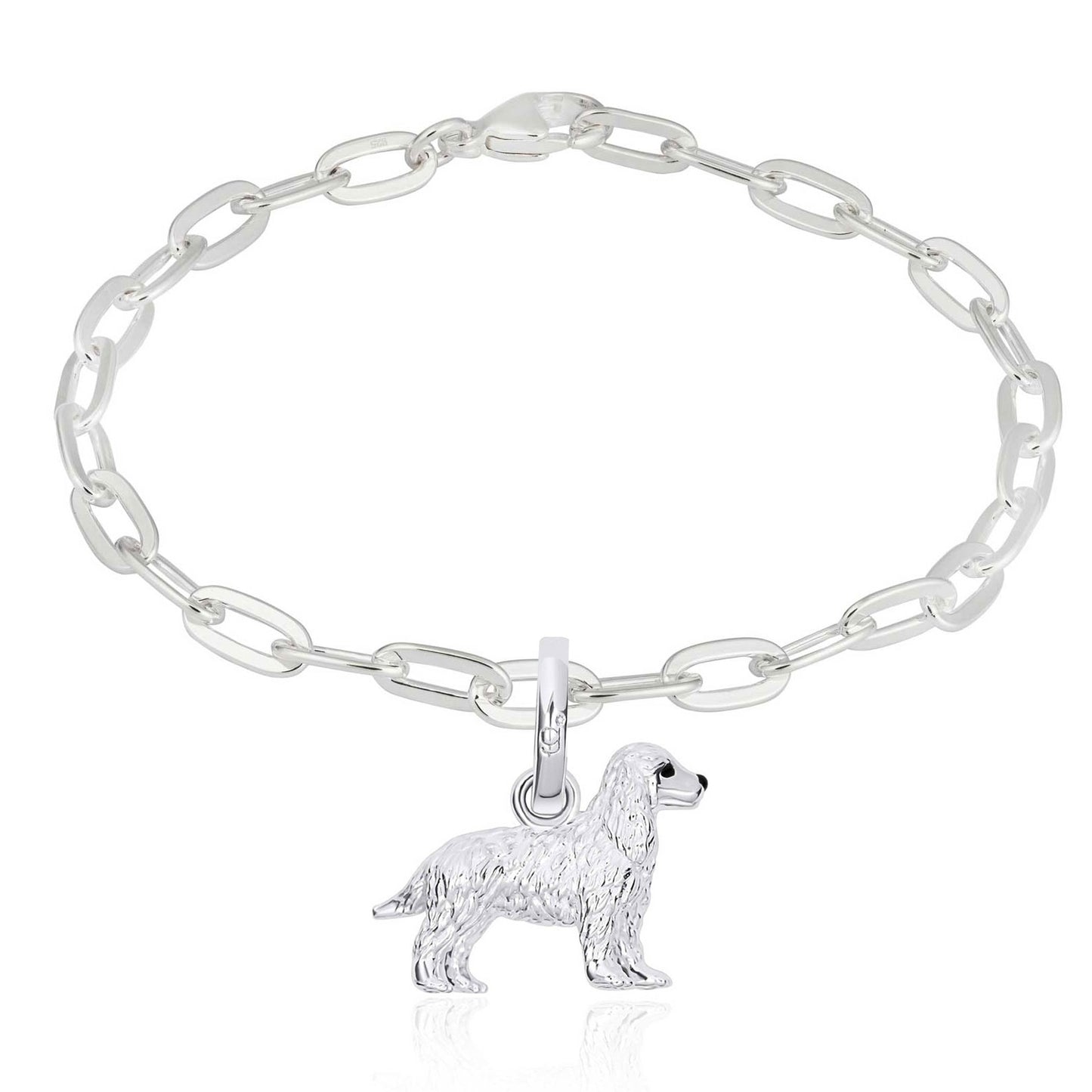 Silver chain bracelet with a dog charm on a white background