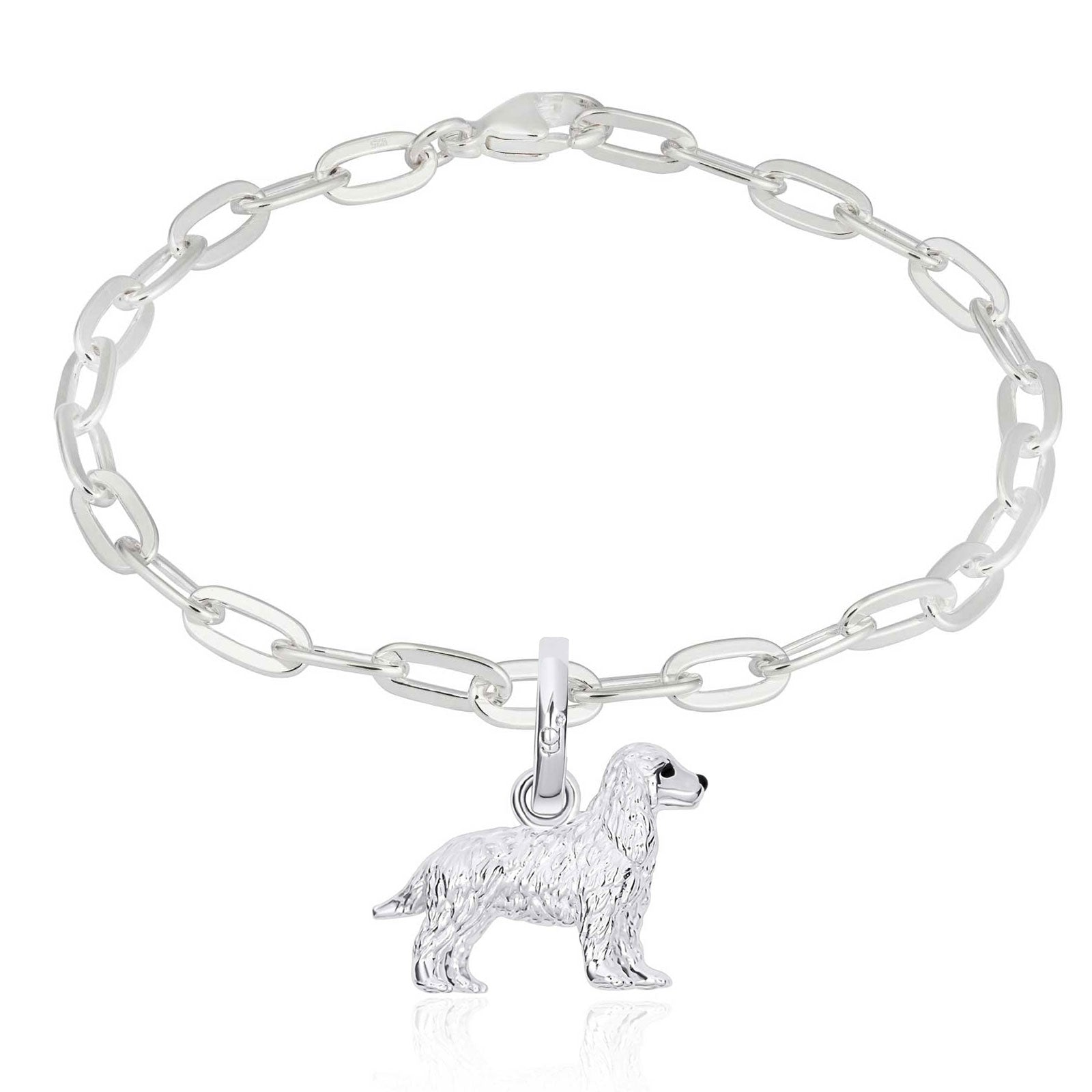 Silver chain bracelet with a dog charm on a white background