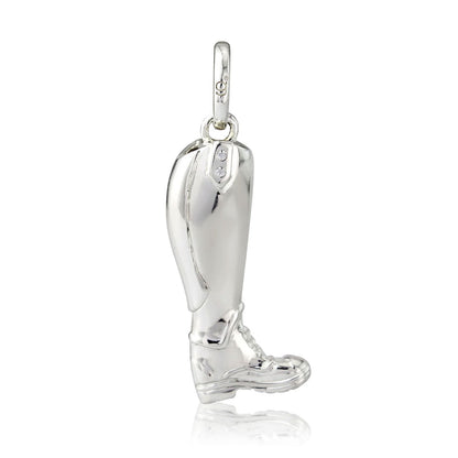 Silver boot-shaped pendant on a white background