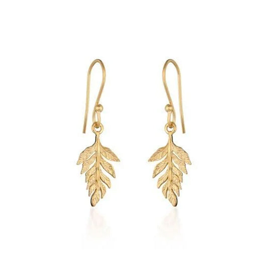 A pair of gold leaf drop earrings with textured leaf pendants and fishhook wires, shown on a clean white background.