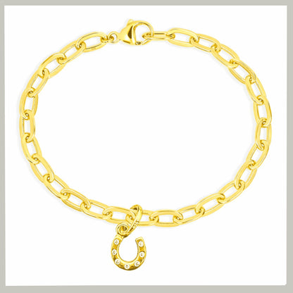 gold-horseshoe-charm-sparkly-on-charm-bracelet-on-white-background