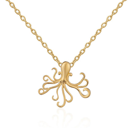Gold octopus pendant on a chain against a white background