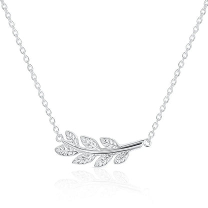 A silver laurel leaf pendant necklace on a delicate link chain, set against a clean white background with a subtle reflection below.