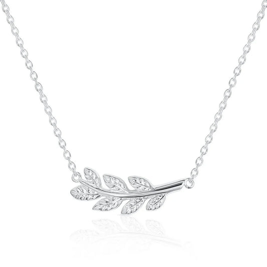 A silver laurel leaf pendant necklace on a delicate link chain, set against a clean white background with a subtle reflection below.