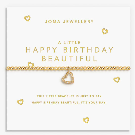 Gold bracelet with heart charm on a Joma Jewellery card