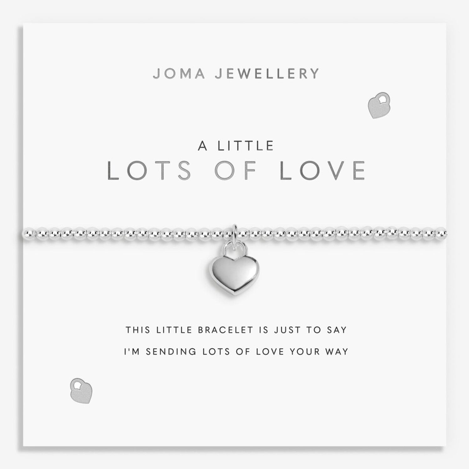 Silver heart bracelet on Joma Jewellery packaging with text.