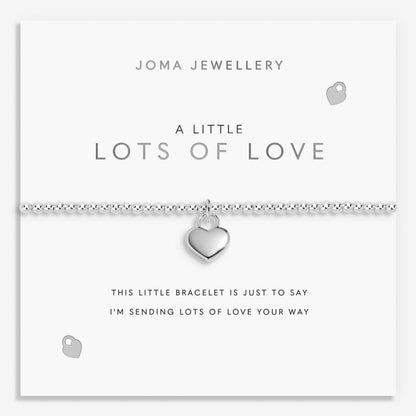 Silver heart bracelet on Joma Jewellery packaging with text.
