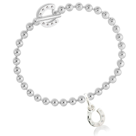 Silver beaded bracelet with a clasp on a white background