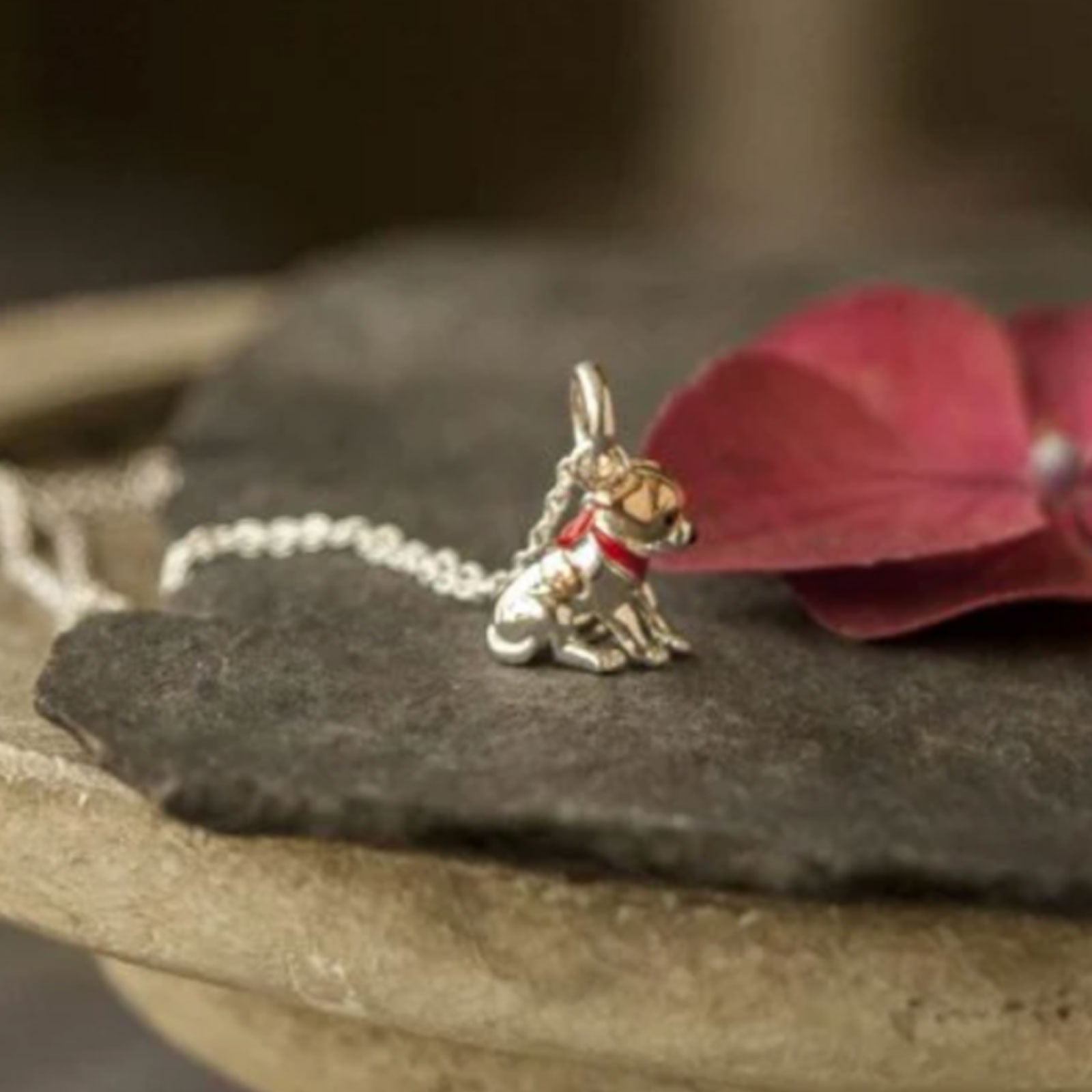 jack russell dog necklace on stone