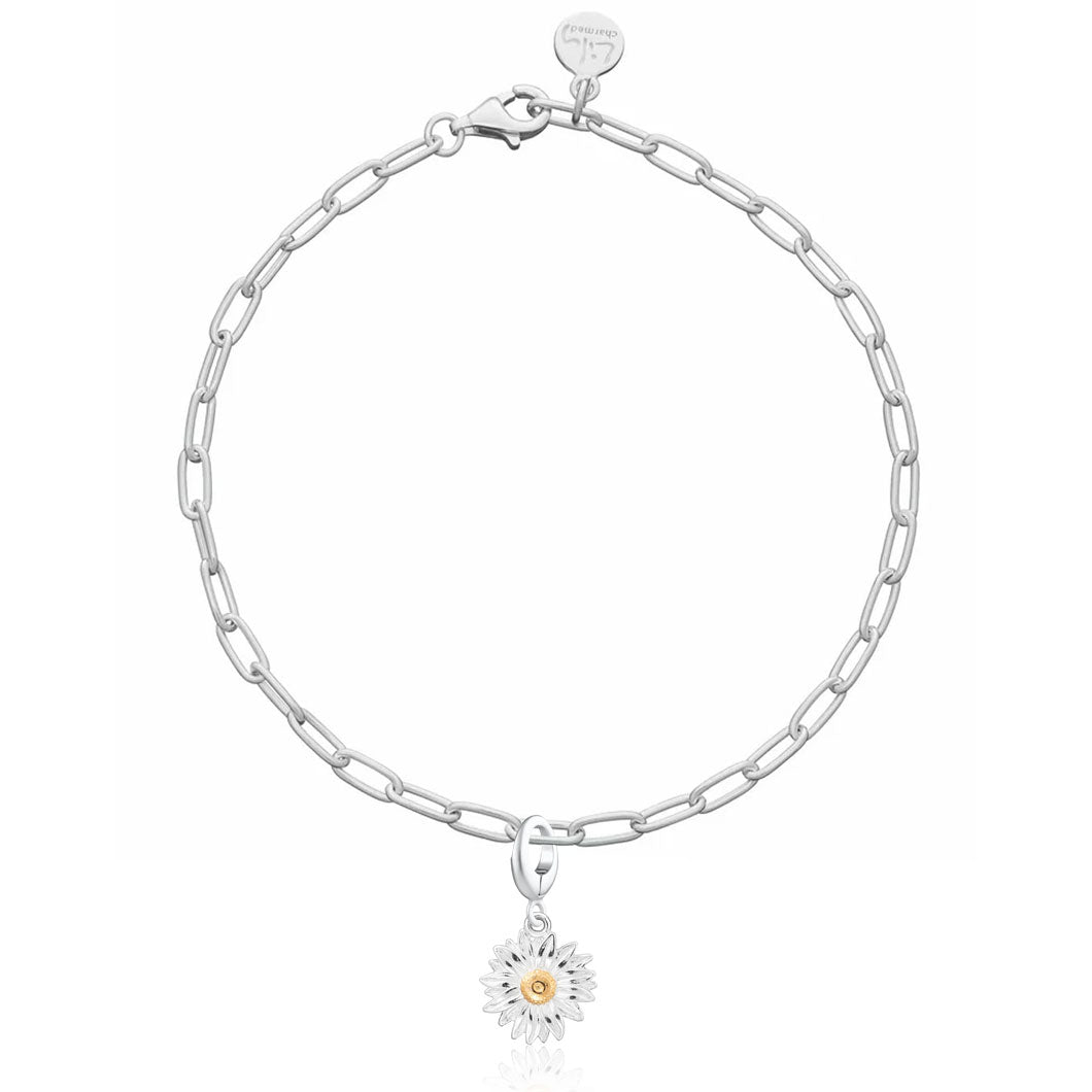 Silver chain bracelet with a sunflower charm on a white background
