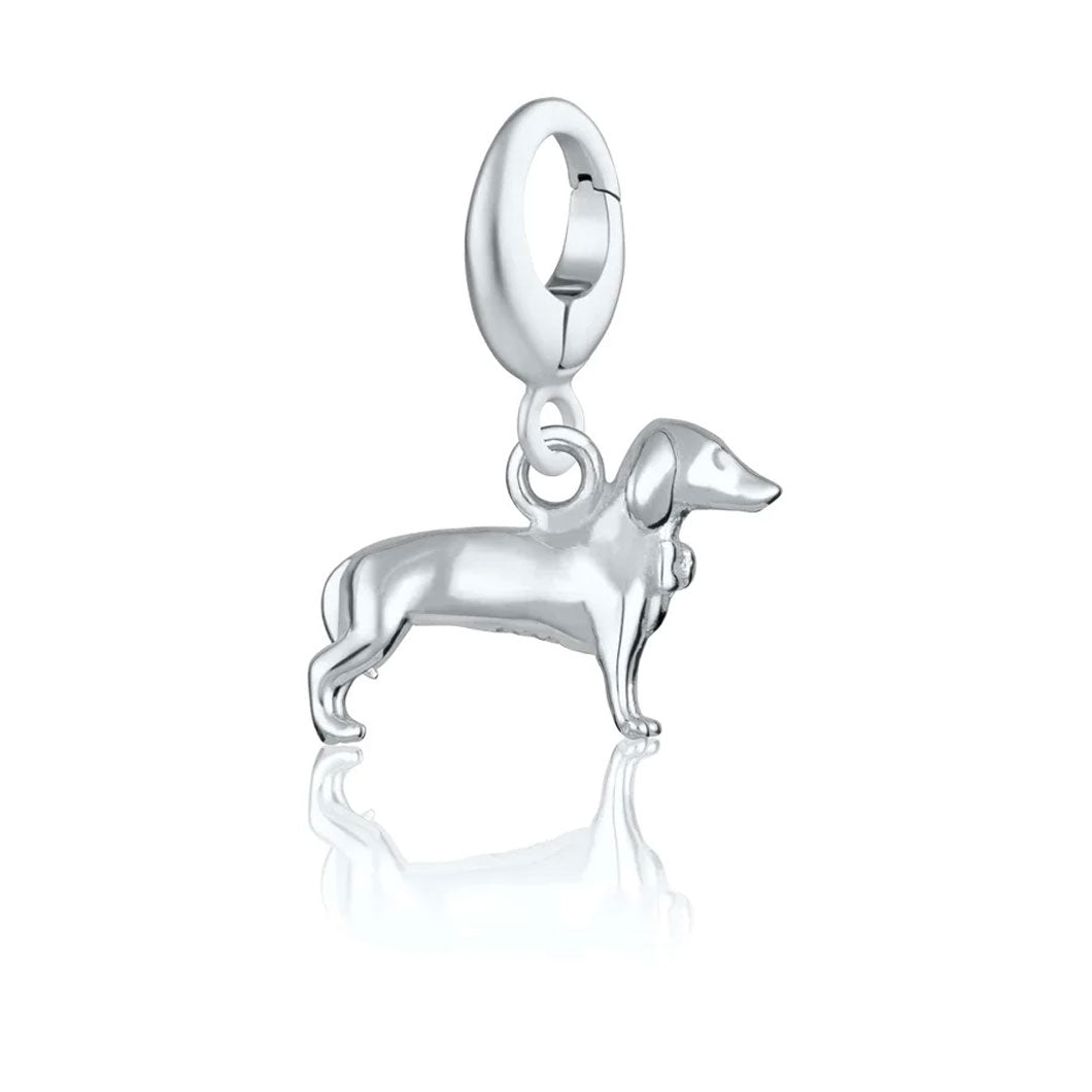 Silver dachshund charm on a white background