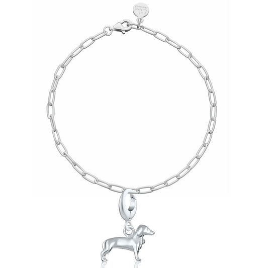 Silver chain bracelet with a dog charm on a white background