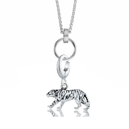 Silver necklace with a tiger pendant on a white background