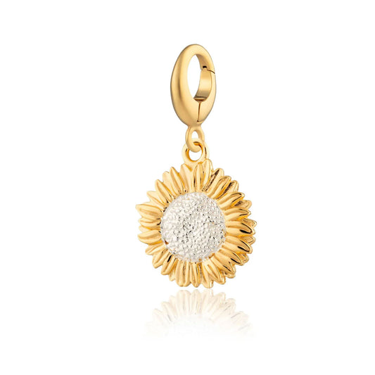 Gold sunflower-shaped pendant on a white background